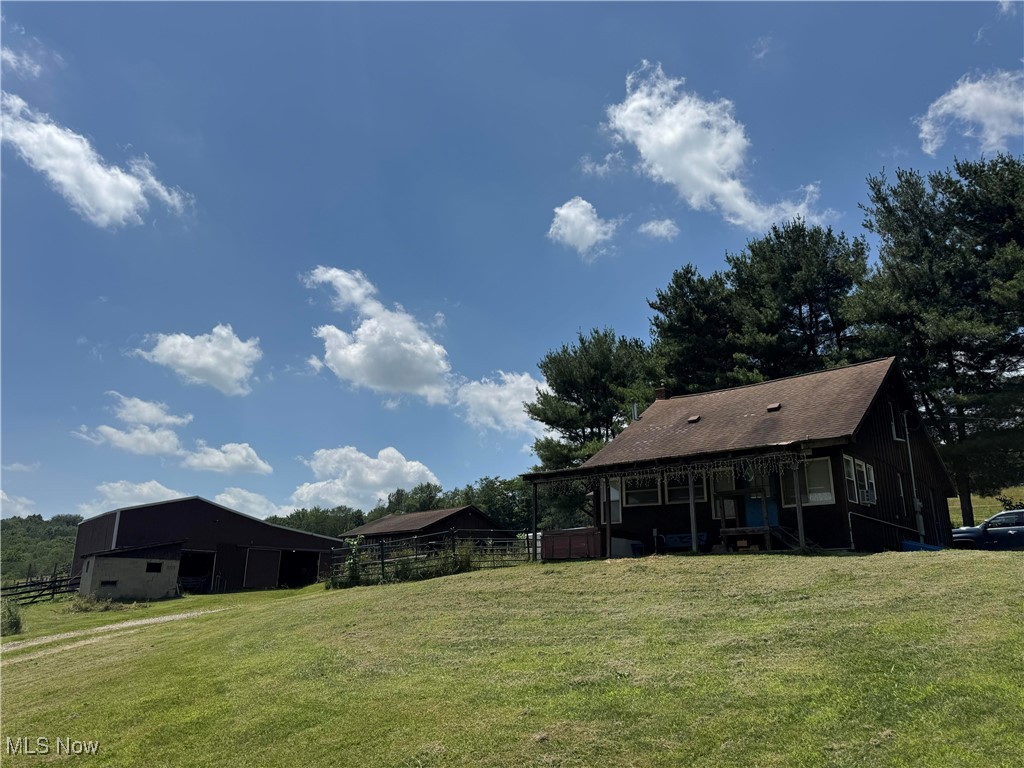 10097 March Road Northeast East Rochester, OH 44625 - Photo 1 of 34 View of yard