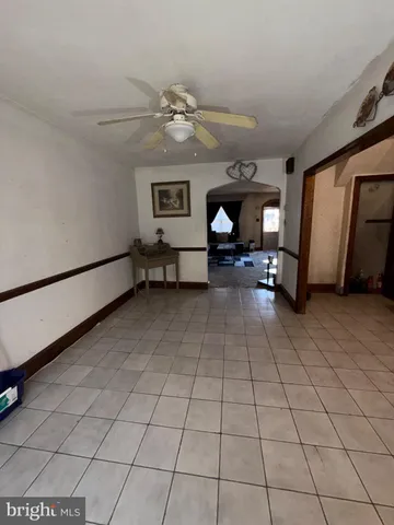 a kitchen with a sink a stove and cabinets