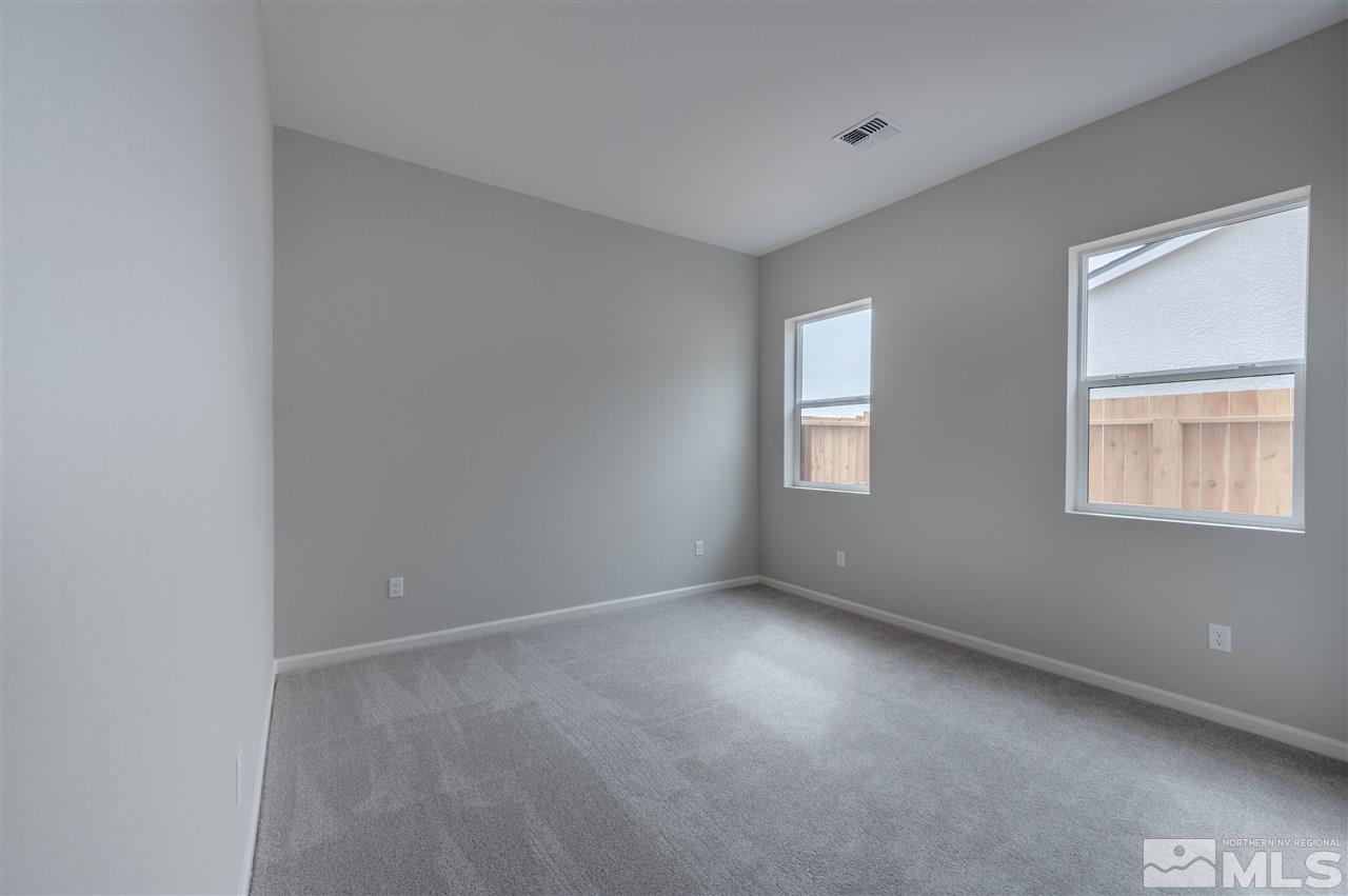 3035 Country Wind Lane, Unit HOMESITE 72 Reno, NV 89521 - Photo 12 of 15 a view of an empty room with a window