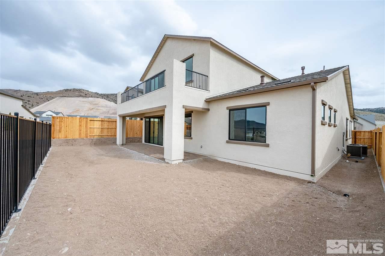3035 Country Wind Lane, Unit HOMESITE 72 Reno, NV 89521 - Photo 15 of 15 a view of a house with a backyard