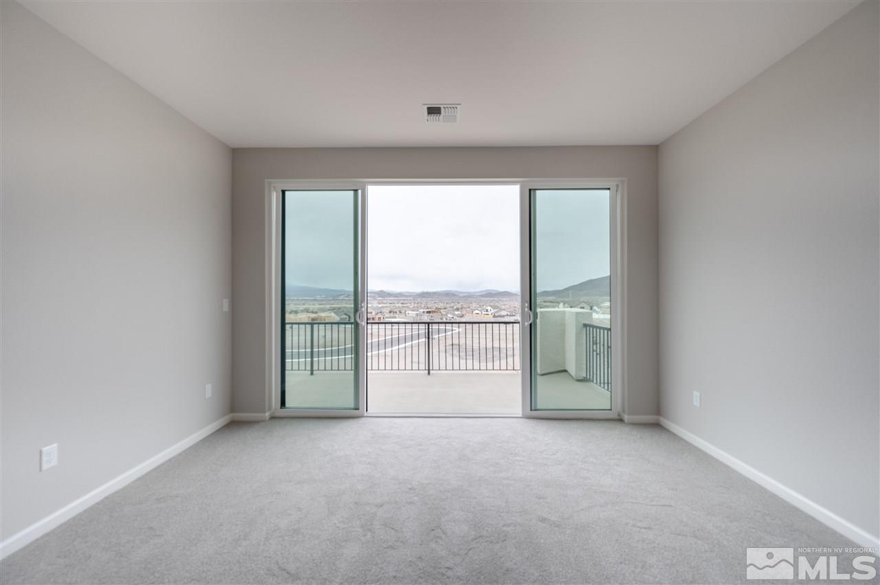 3035 Country Wind Lane, Unit HOMESITE 72 Reno, NV 89521 - Photo 8 of 15 a view of an empty room and window