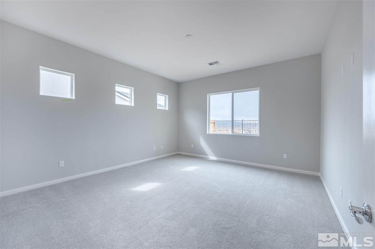 3035 Country Wind Lane, Unit HOMESITE 72 Reno, NV 89521 - Photo 9 of 15 a view of an empty room with a window