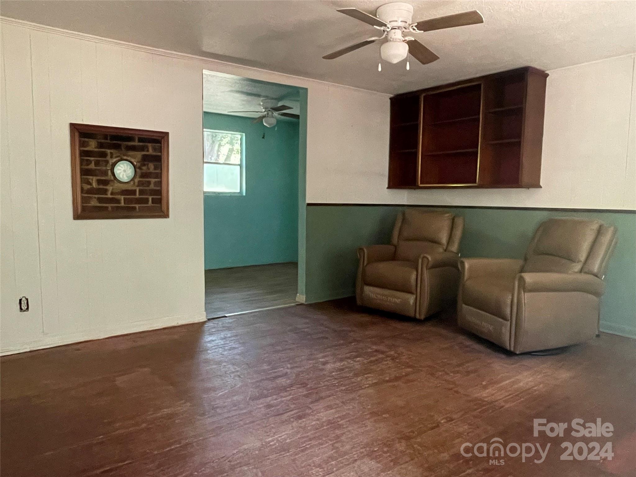77 Medford Road Tryon, NC 28782 - Photo 25 of 48 a living room with furniture and a window