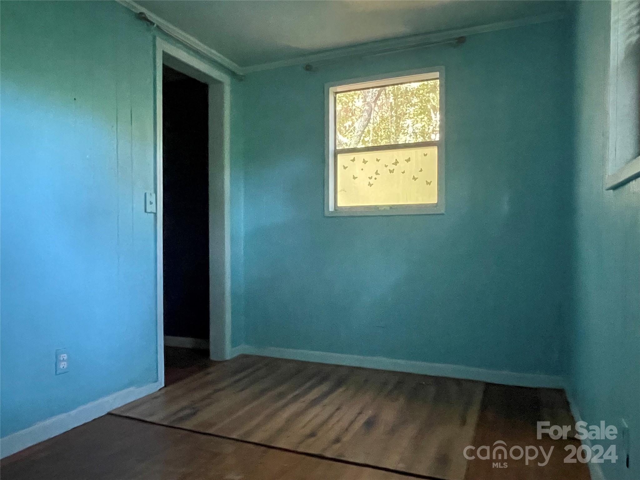 77 Medford Road Tryon, NC 28782 - Photo 36 of 48 an empty room with a window