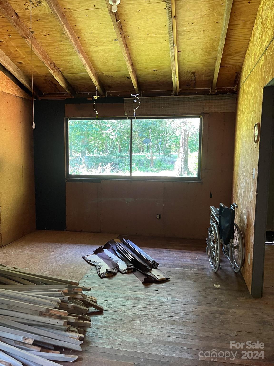 77 Medford Road Tryon, NC 28782 - Photo 44 of 48 a room with furniture and a window