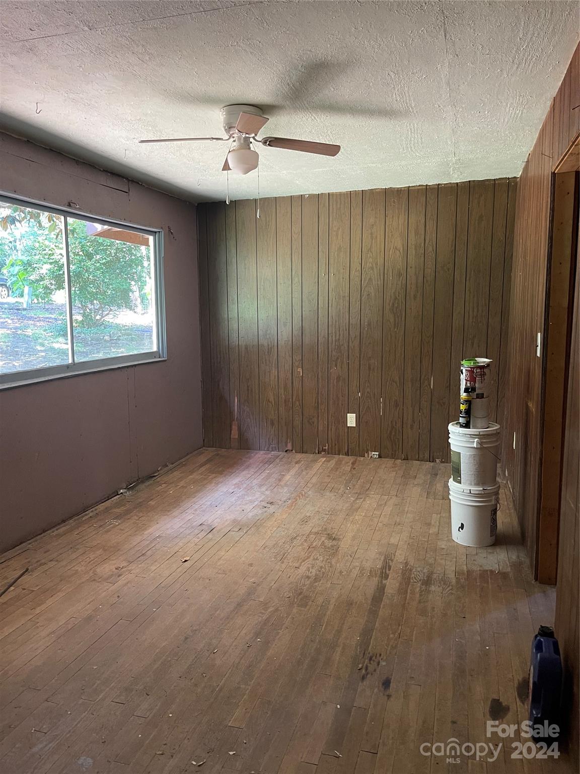 77 Medford Road Tryon, NC 28782 - Photo 45 of 48 a view of a room with a hanging light and a window
