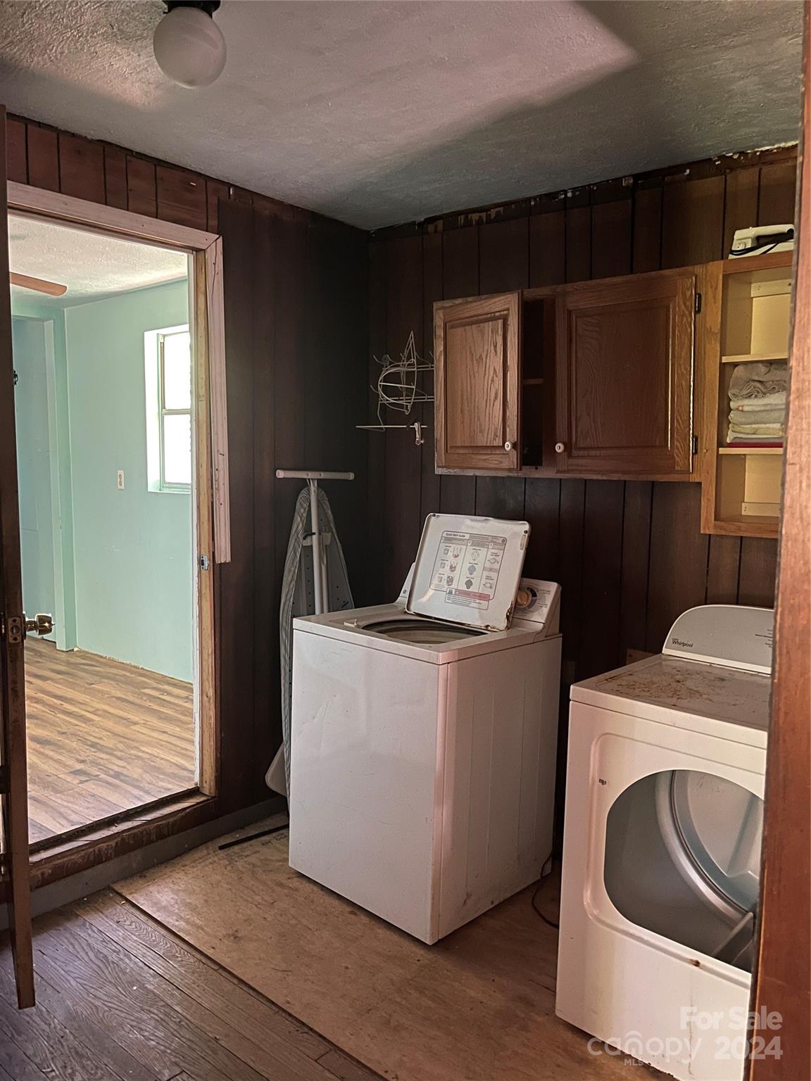 77 Medford Road Tryon, NC 28782 - Photo 46 of 48 a utility room with dryer and washer