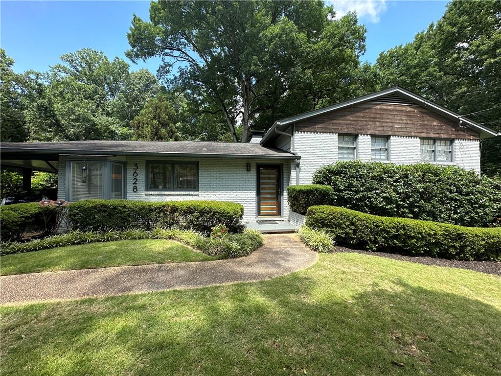 3628 Cold Spring Lane Chamblee, GA 30341 - Photo 1 of 1 a view of a house with yard and plants
