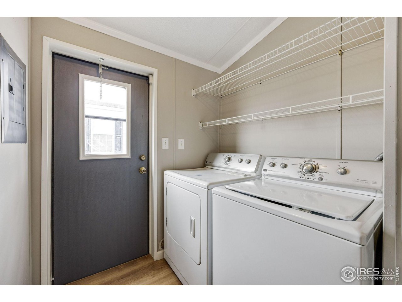517 East Trilby Road, Unit 102 Fort Collins, CO 80525 - Photo 14 of 19 a utility room with dryer and washer