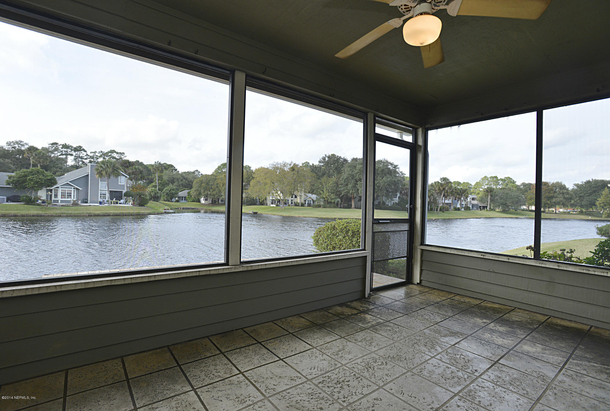 809 Tournament Road Ponte Vedra Beach, FL 32082 - Photo 25 of 28 Screened Back Porch with Water View