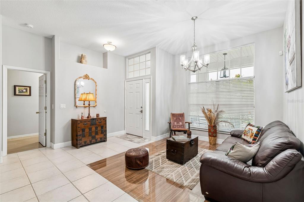 2006 Meadow Rue Court Trinity, FL 34655 - Photo 47 of 96 a living room with furniture and wooden floor