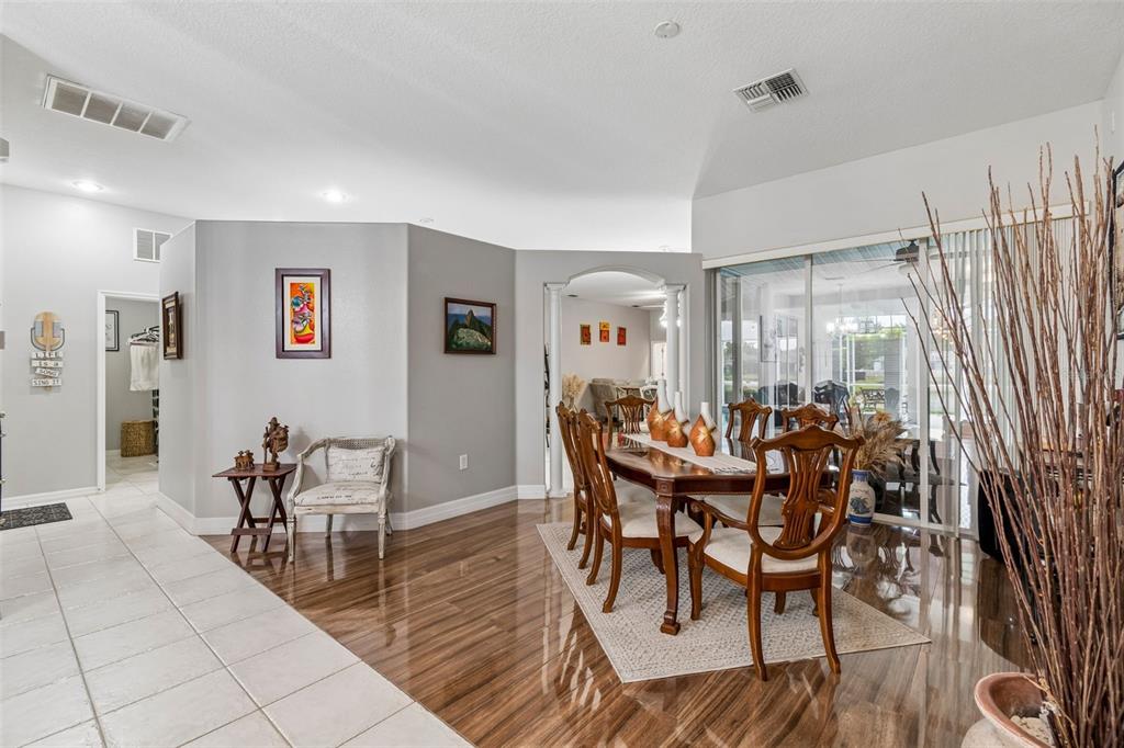 2006 Meadow Rue Court Trinity, FL 34655 - Photo 50 of 96 a view of a dining room with furniture and chandelier