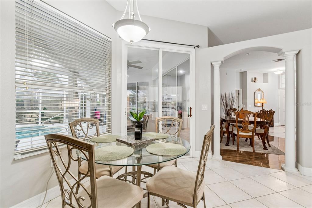 2006 Meadow Rue Court Trinity, FL 34655 - Photo 54 of 96 a view of a dining room with furniture window and outside view