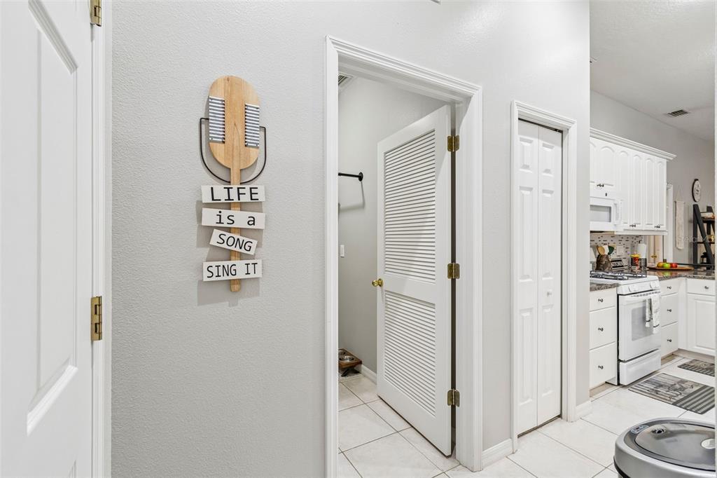 2006 Meadow Rue Court Trinity, FL 34655 - Photo 60 of 96 a view of a hallway with washer and dryer