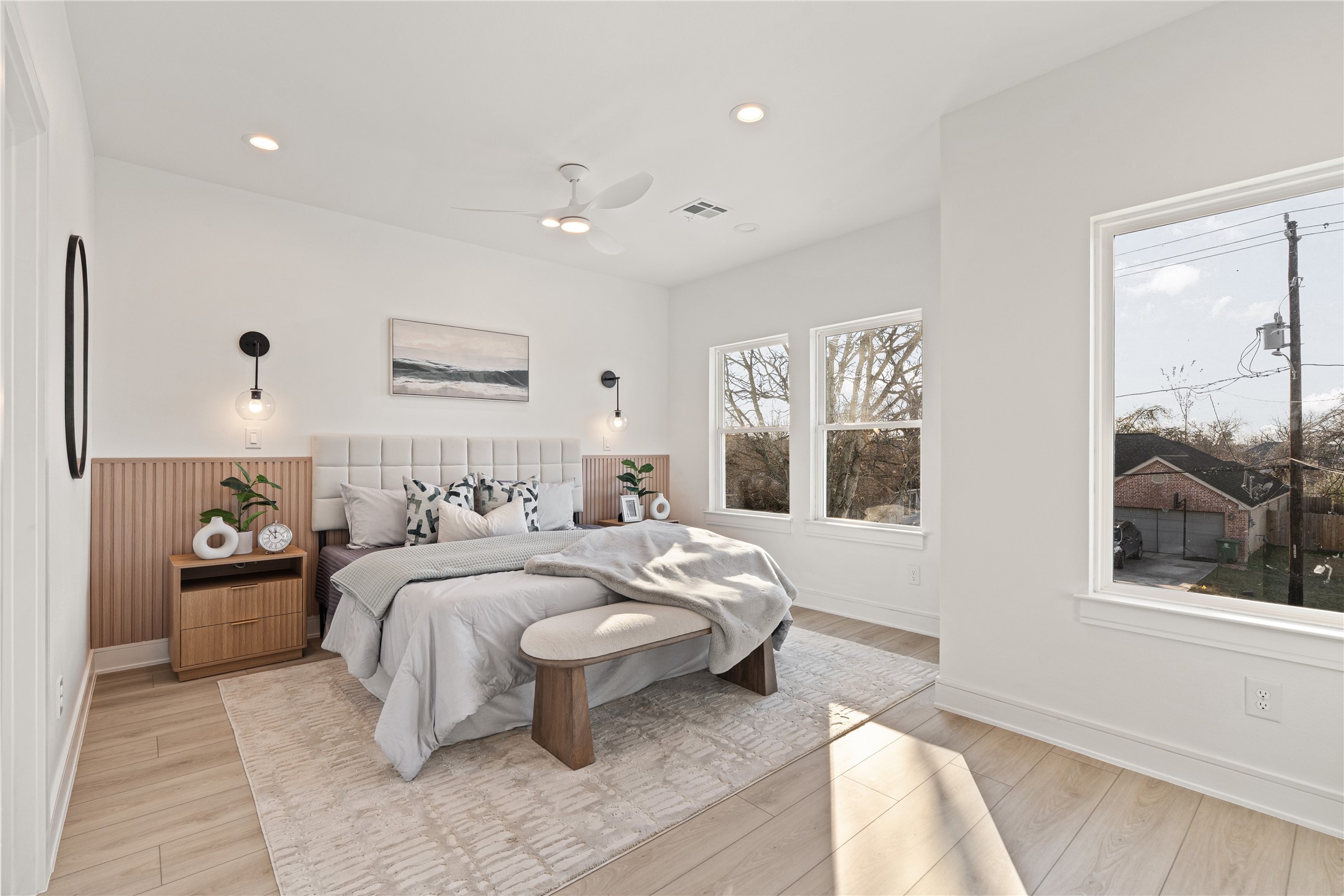 8019 Grandview Street Houston, TX 77051 - Photo 18 of 34 Spacious primary bedroom with large windows, soft natural light, and a peaceful retreat feel.