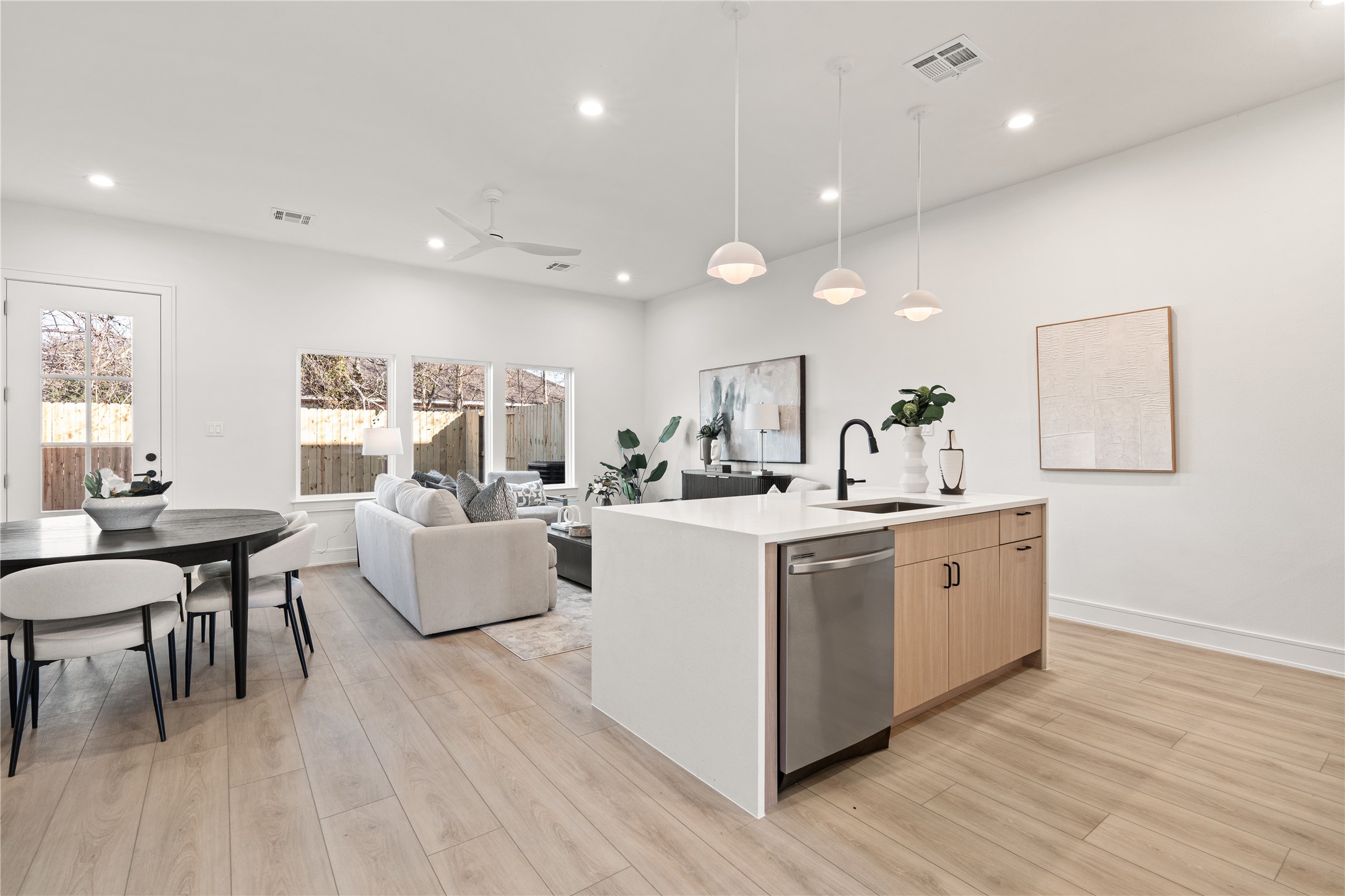 8019 Grandview Street Houston, TX 77051 - Photo 5 of 34 Open-concept living, dining, and kitchen area designed for easy flow and entertaining.