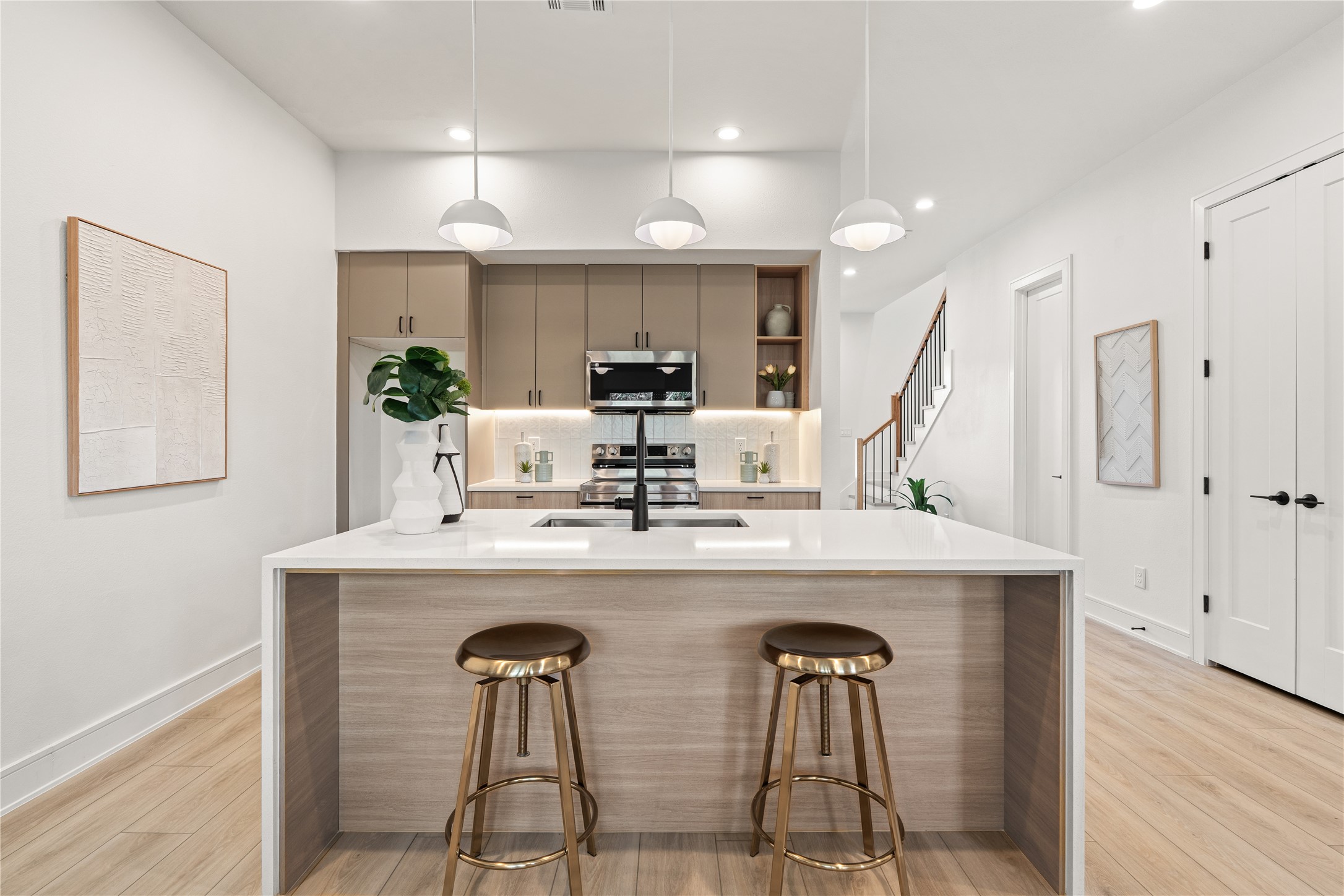 8019 Grandview Street Houston, TX 77051 - Photo 7 of 34 Kitchen island with bar seating—perfect for casual meals, hosting, or gathering with guests.