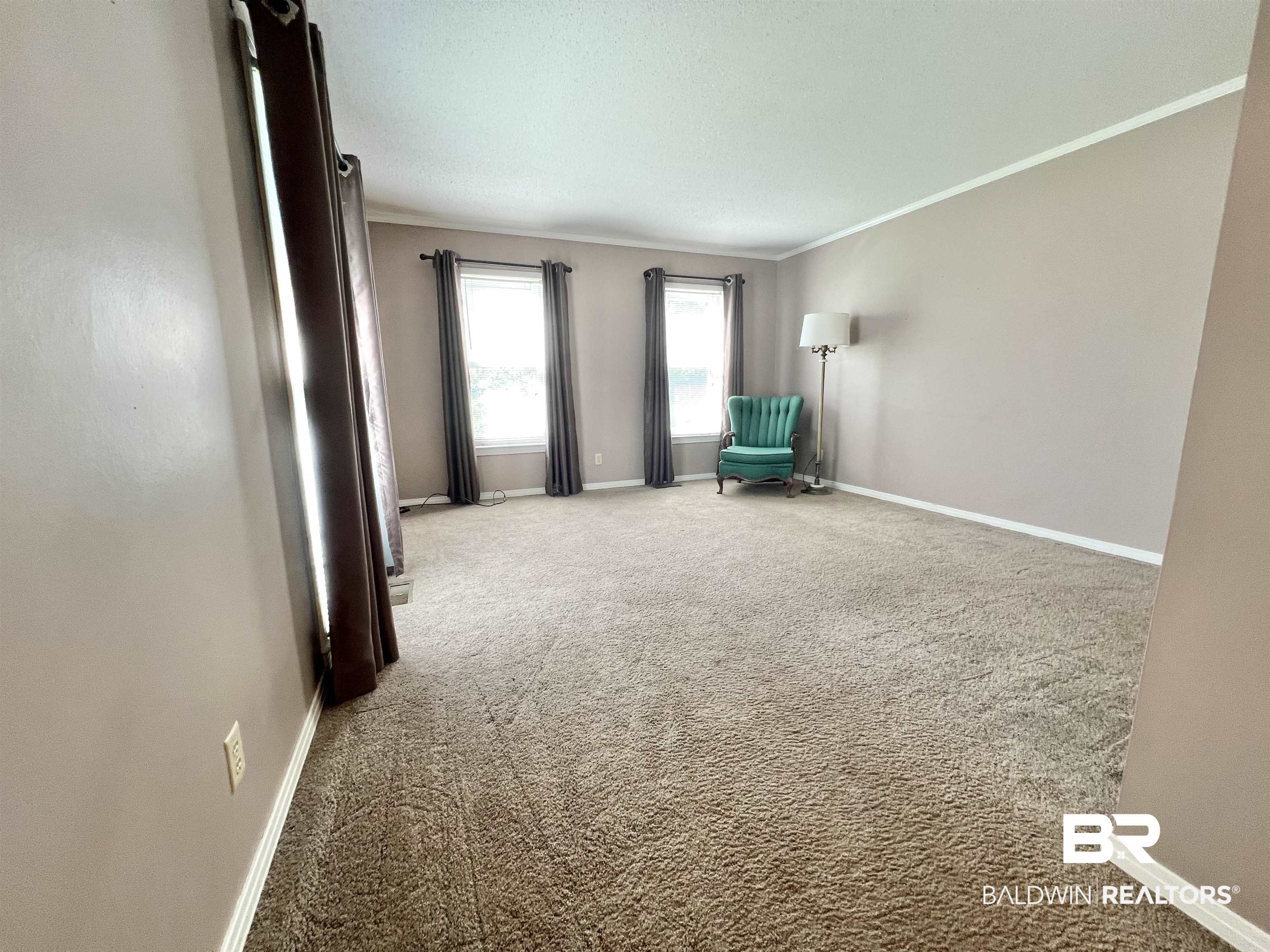2691 Appleton Road Brewton, AL 36426 - Photo 23 of 60 Unfurnished room featuring carpet floors and crown molding
