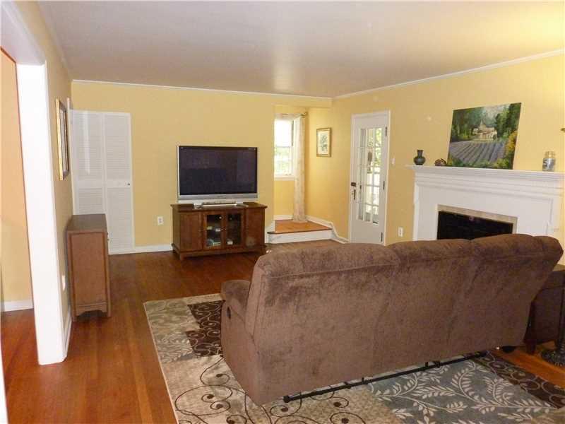 108 Byron Road Pittsburgh, PA 15237 - Photo 2 of 25 Living Room. Spacious living room offers a wood burning fireplace with mantle. All the hardood floors have been refinished!