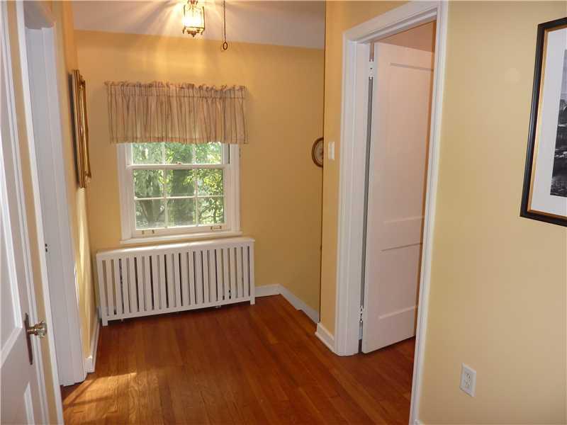 108 Byron Road Pittsburgh, PA 15237 - Photo 13 of 25 Other. A large hallway leads to the bedrooms. Notice all the beautiful hardwood flooring and coverings for the heaters.