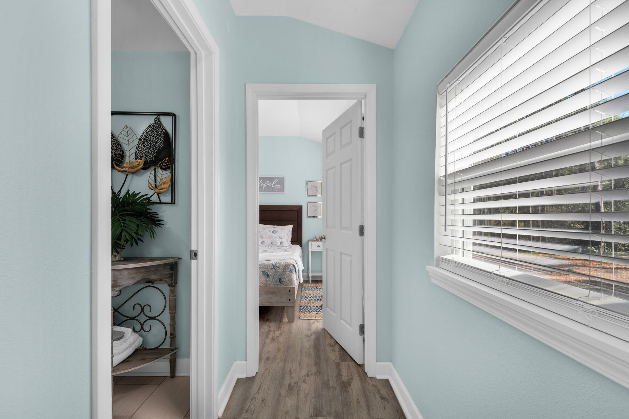 156 McCloud Road Freeport, FL 32439 - Photo 11 of 28 a view of a hallway with closet and a livingroom view