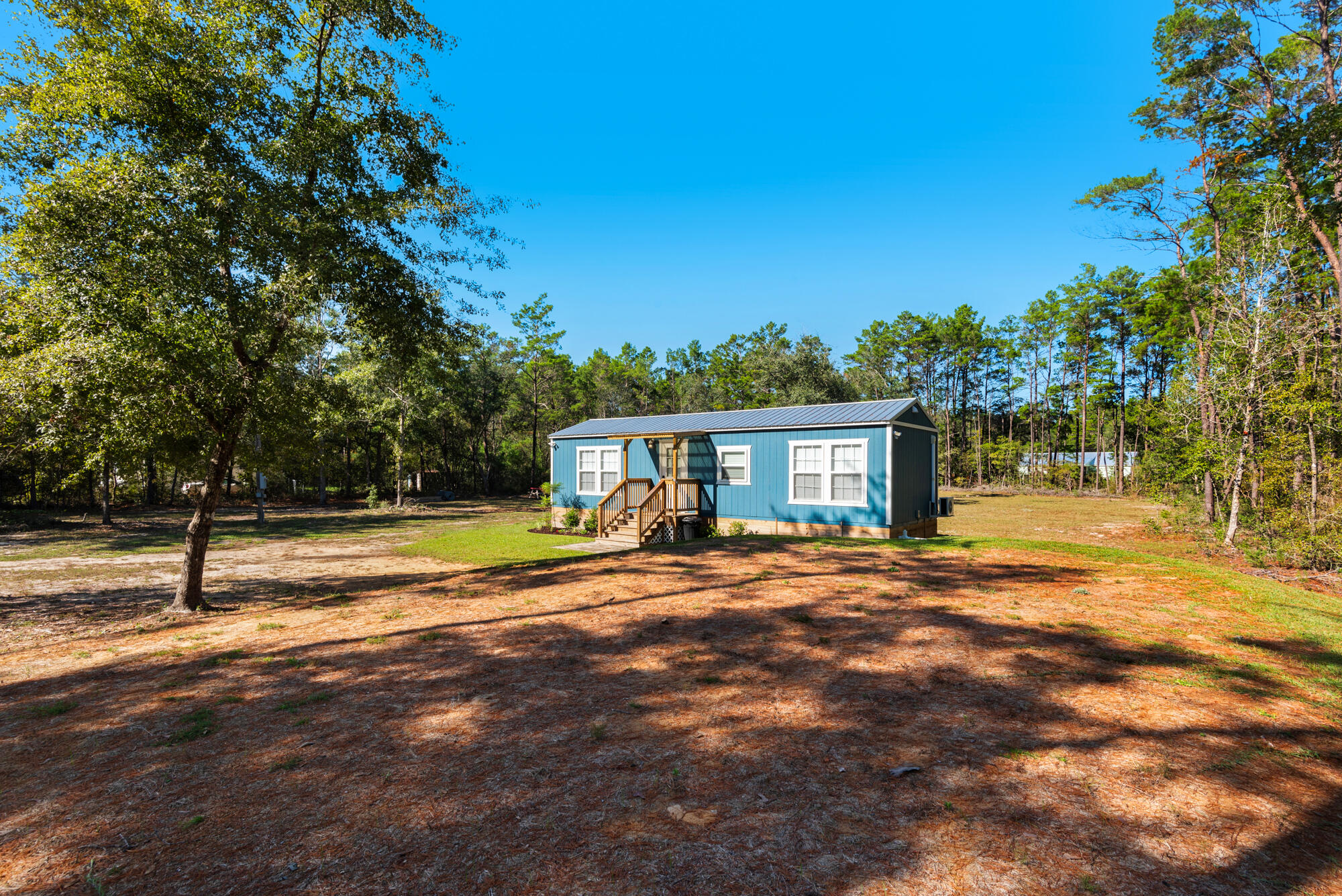 156 McCloud Road Freeport, FL 32439 - Photo 27 of 28 a view of a house with a yard