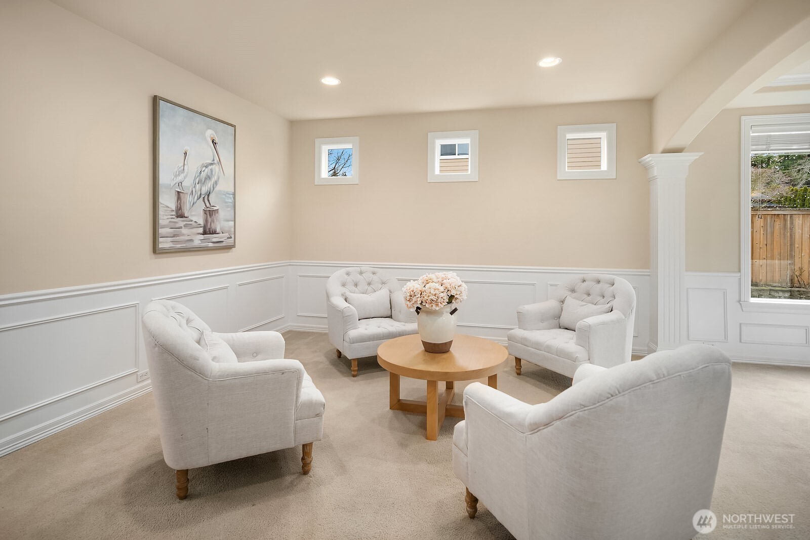 5504 Northeast 13th Place Renton, WA 98059 - Photo 14 of 36 a living room with furniture and a large window