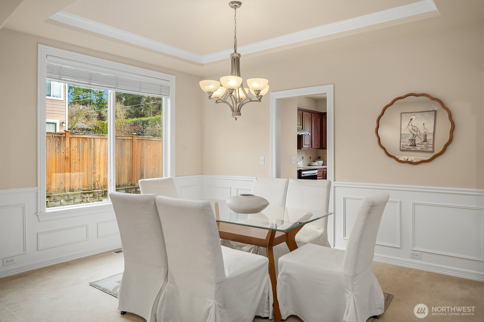 5504 Northeast 13th Place Renton, WA 98059 - Photo 17 of 36 a view of a dining room with furniture window and wooden floor