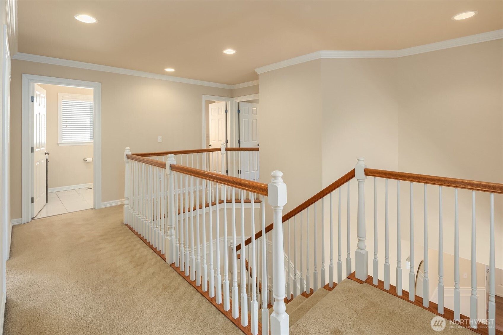 5504 Northeast 13th Place Renton, WA 98059 - Photo 22 of 36 a view of a hallway with a staircase