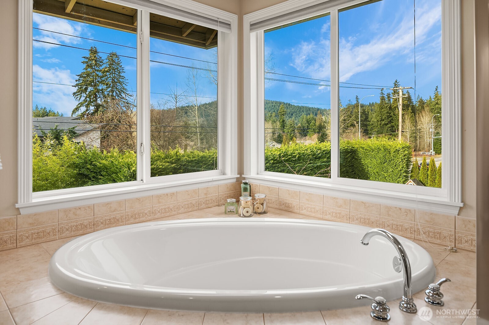 5504 Northeast 13th Place Renton, WA 98059 - Photo 26 of 36 a bath tub sitting in front of a window