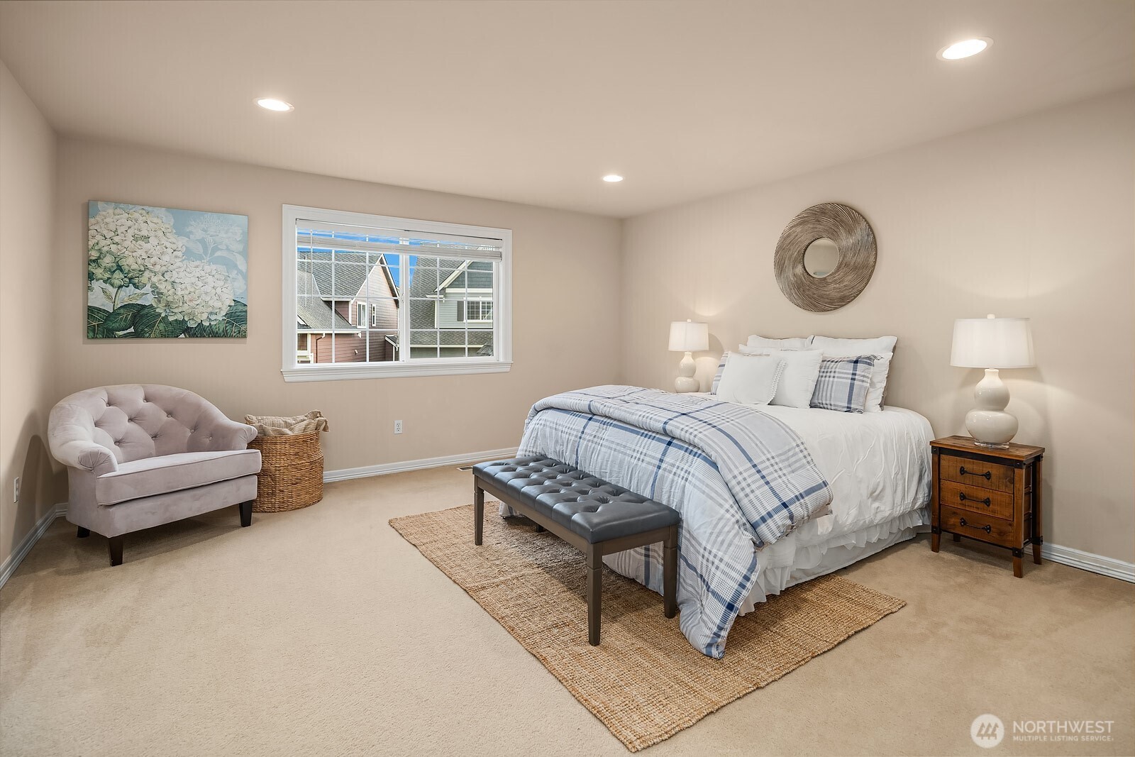 5504 Northeast 13th Place Renton, WA 98059 - Photo 27 of 36 a bed room with a bed and a couch