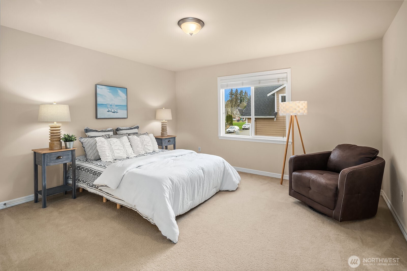 5504 Northeast 13th Place Renton, WA 98059 - Photo 28 of 36 a bedroom with bed couch and window