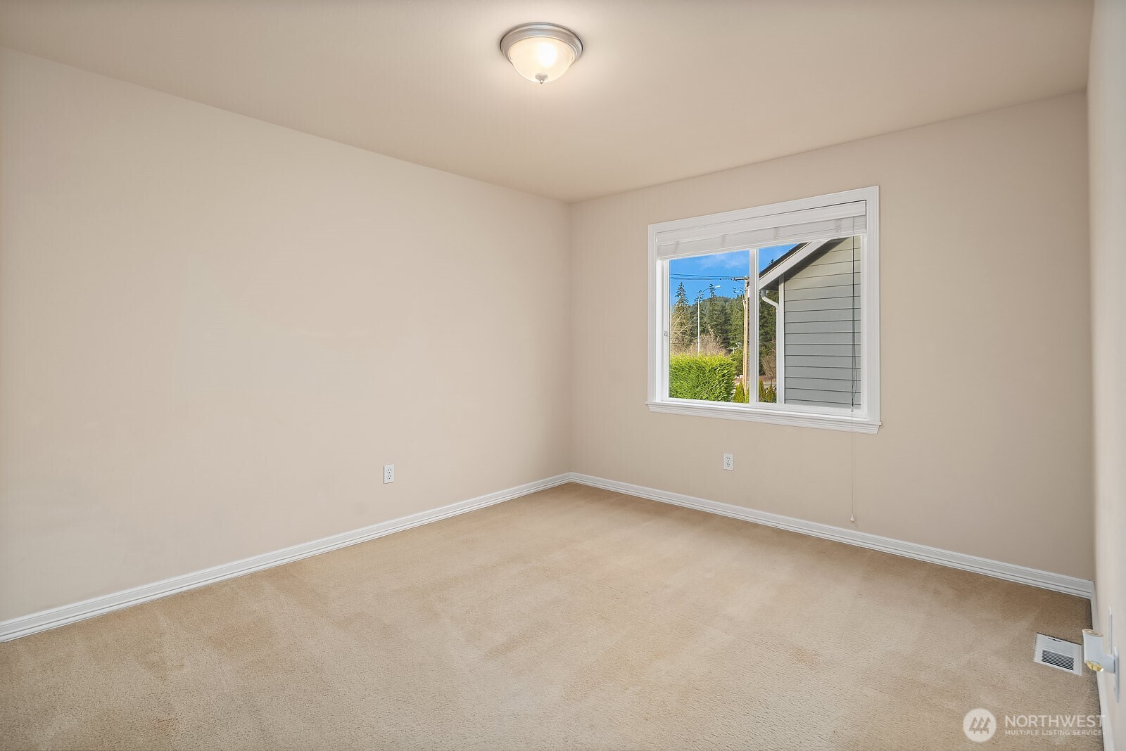 5504 Northeast 13th Place Renton, WA 98059 - Photo 29 of 36 an empty room with a window