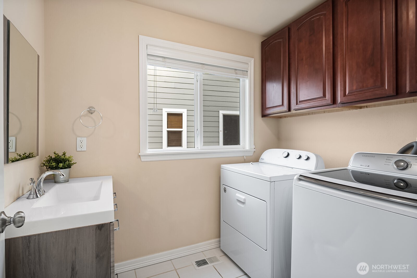 5504 Northeast 13th Place Renton, WA 98059 - Photo 32 of 36 a utility room with dryer and washer