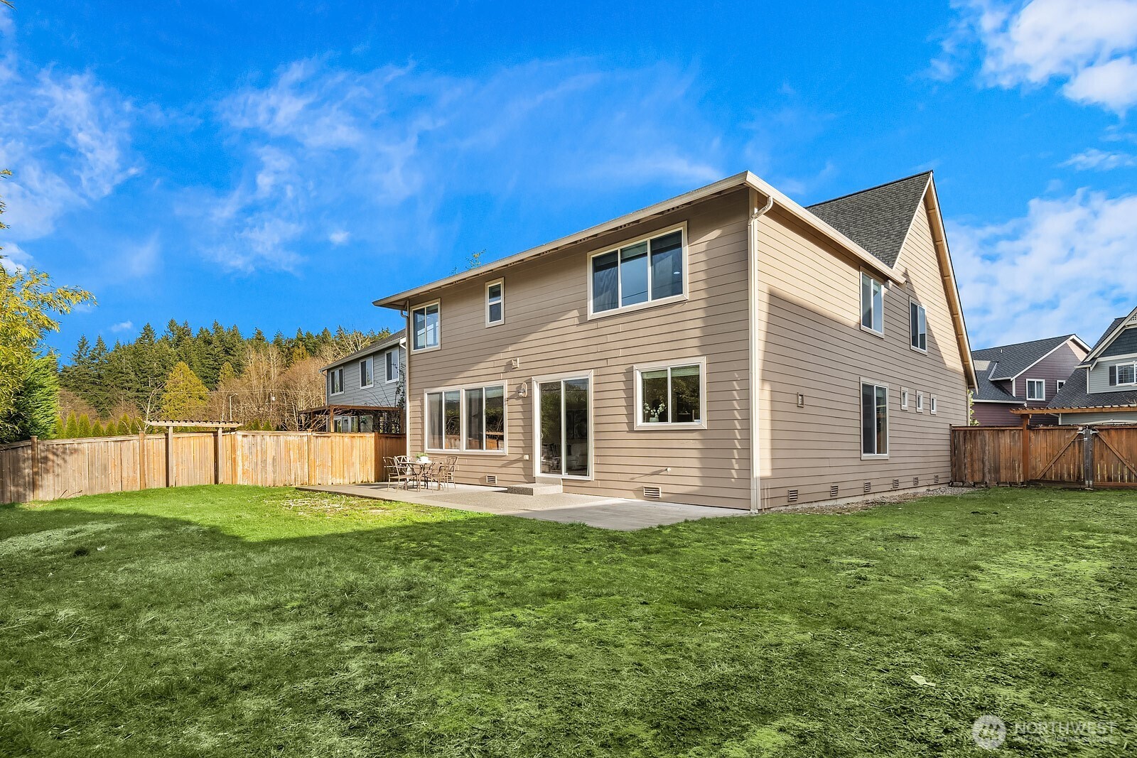5504 Northeast 13th Place Renton, WA 98059 - Photo 33 of 36 a front view of house with yard and green space