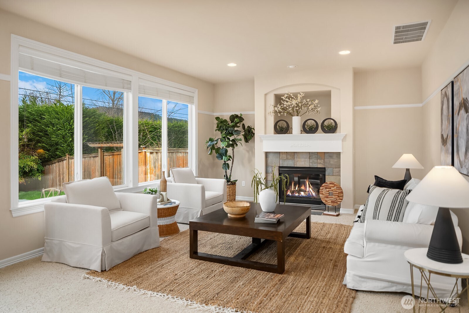 5504 Northeast 13th Place Renton, WA 98059 - Photo 5 of 36 a living room with furniture and a fireplace