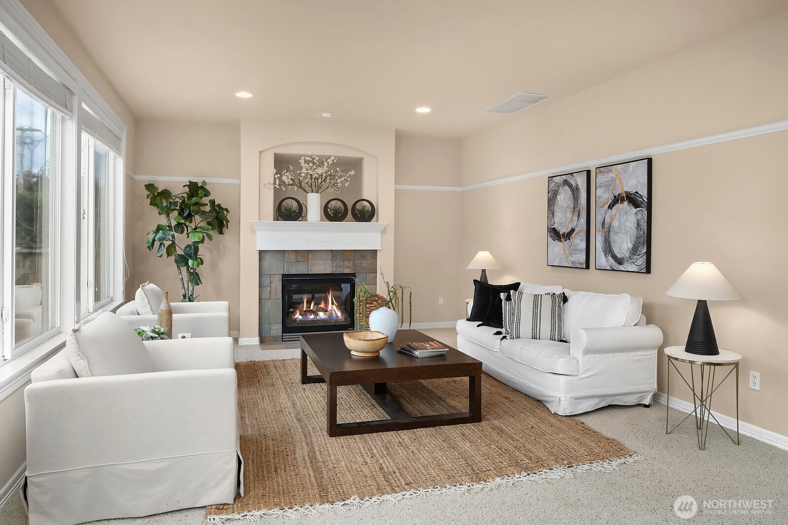 5504 Northeast 13th Place Renton, WA 98059 - Photo 6 of 36 a living room with furniture and a fireplace