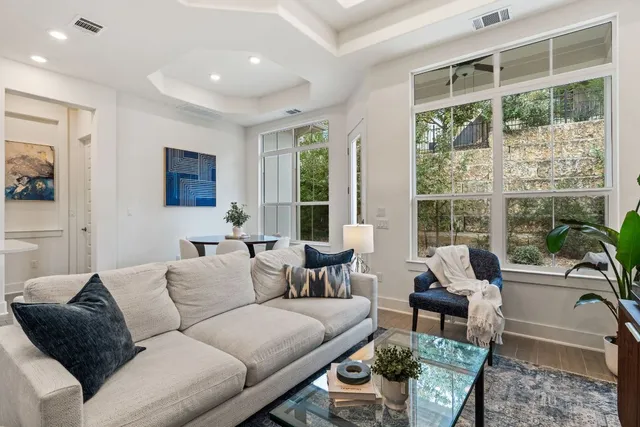 a living room with furniture and a window