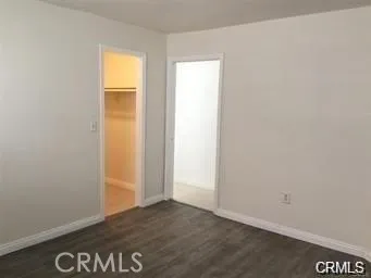 an empty room with a door