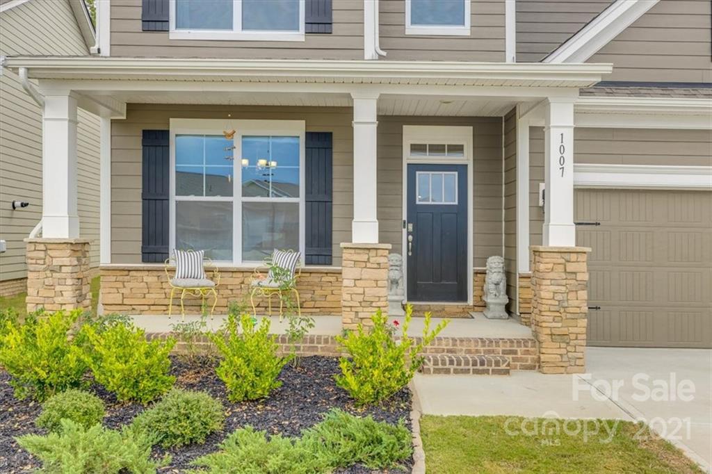1007 Lydney Circle Waxhaw, NC 28173 - Photo 2 of 46 front view of a brick house with a large window