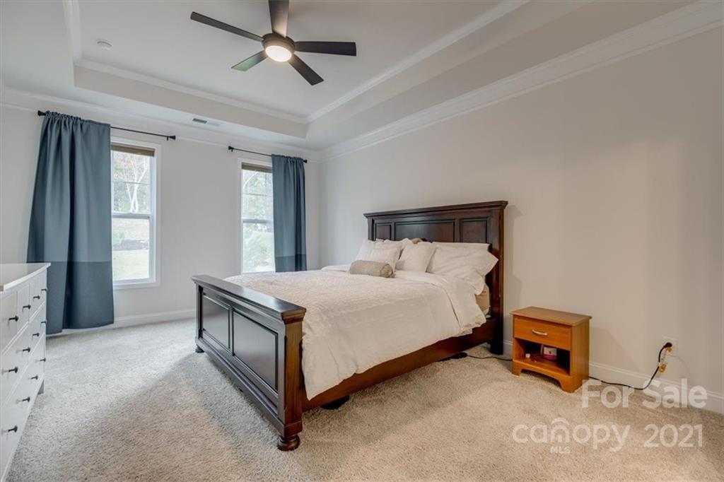 1007 Lydney Circle Waxhaw, NC 28173 - Photo 20 of 46 a bed sitting in a room next to a window