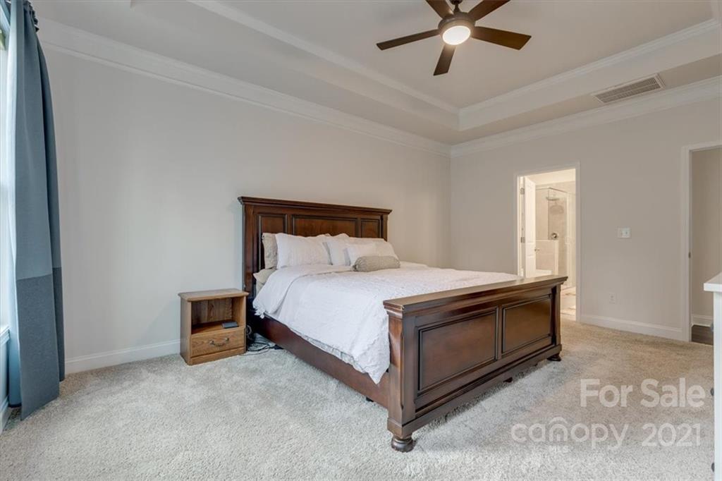 1007 Lydney Circle Waxhaw, NC 28173 - Photo 21 of 46 a bedroom with a bed and window