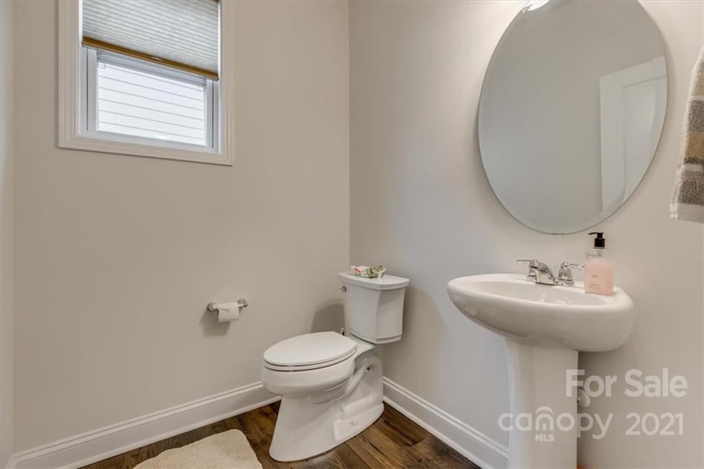 1007 Lydney Circle Waxhaw, NC 28173 - Photo 27 of 46 a bathroom with a sink toilet and a mirror