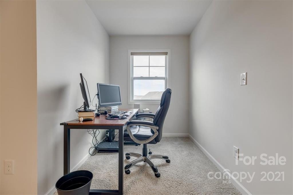 1007 Lydney Circle Waxhaw, NC 28173 - Photo 33 of 46 a view of a workspace with furniture and a window