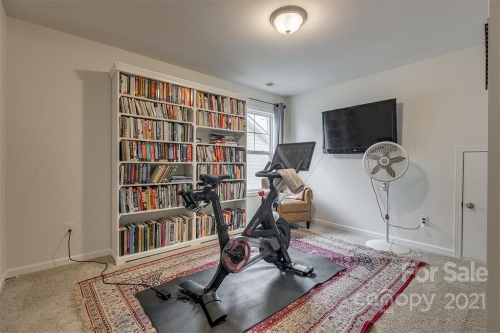 1007 Lydney Circle Waxhaw, NC 28173 - Photo 39 of 46 a view of a room with gym equipment
