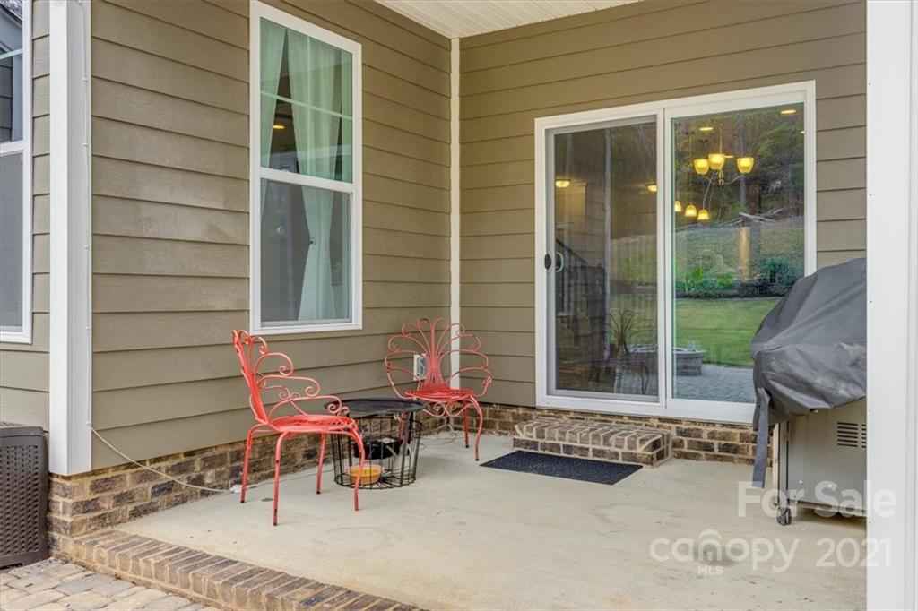 1007 Lydney Circle Waxhaw, NC 28173 - Photo 42 of 46 a backyard of a house with outdoor seating