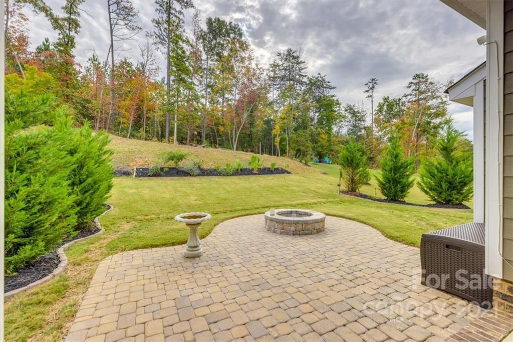 1007 Lydney Circle Waxhaw, NC 28173 - Photo 43 of 46 a view of a lake with a yard