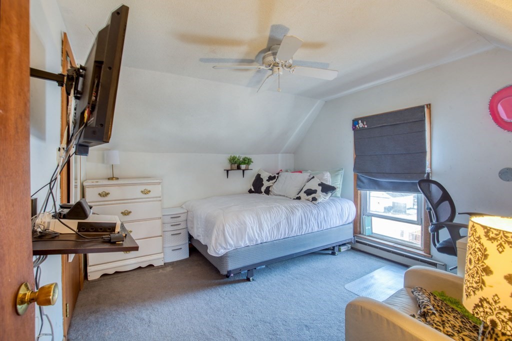 2129 Northampton Street Holyoke, MA 01040 - Photo 14 of 25 a living room with furniture and a window