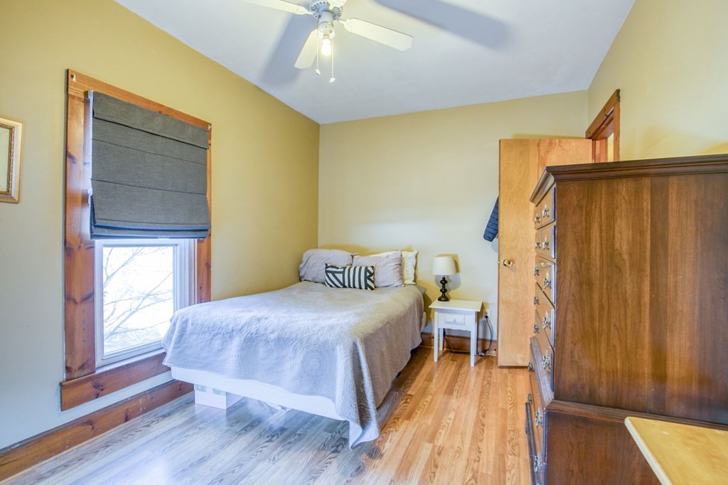 2129 Northampton Street Holyoke, MA 01040 - Photo 15 of 25 a bedroom with a bed and a window