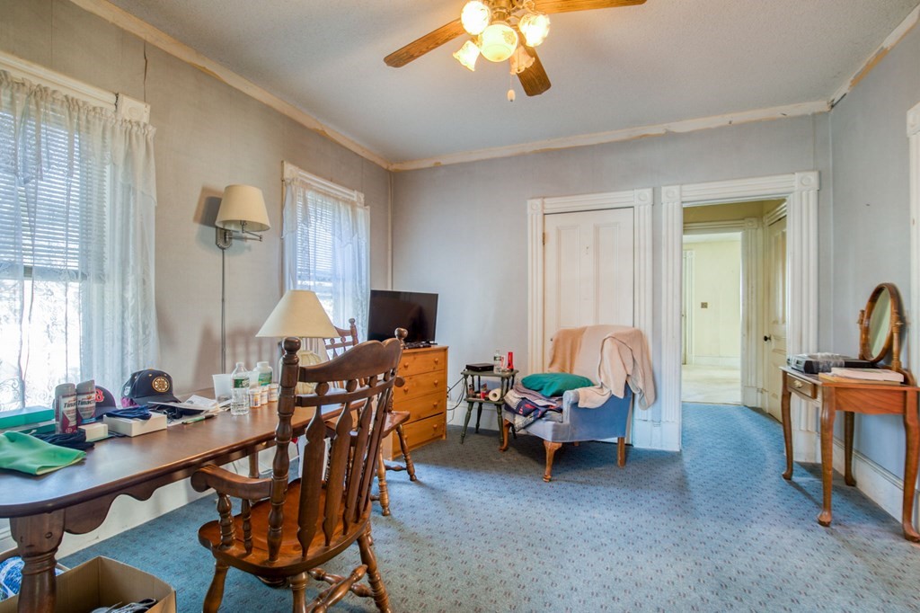 2129 Northampton Street Holyoke, MA 01040 - Photo 19 of 25 a living room with furniture and a flat screen tv